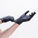 hand stretching the life guard 4 mil black nitrile examination glove powder free and latex free